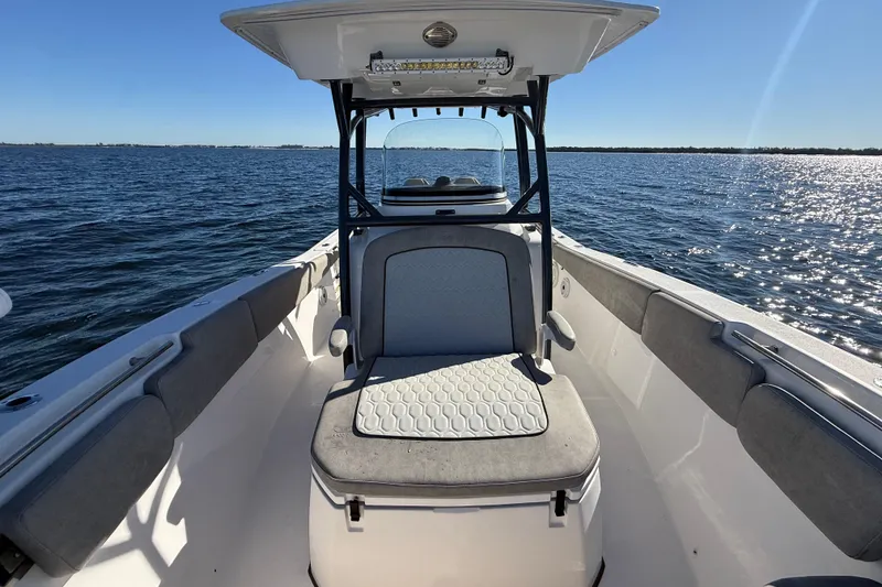 Slide: The Image of 2021 Sea Fox 288 Commander boat on open water, featuring comfortable seating and sleek design. - 64