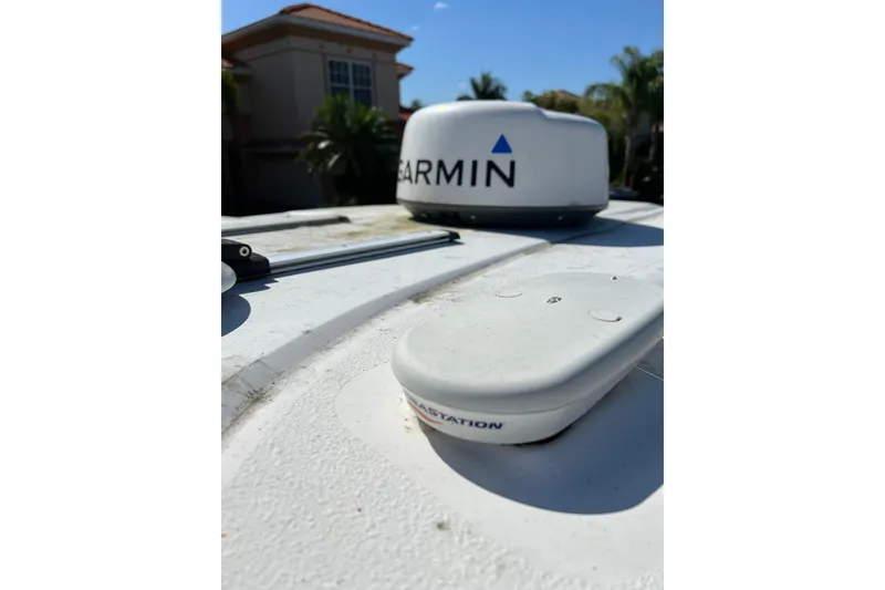 Slide: The Image of 2021 Sea Fox 288 Commander boat on open water, featuring dual Yamaha engines. - 7