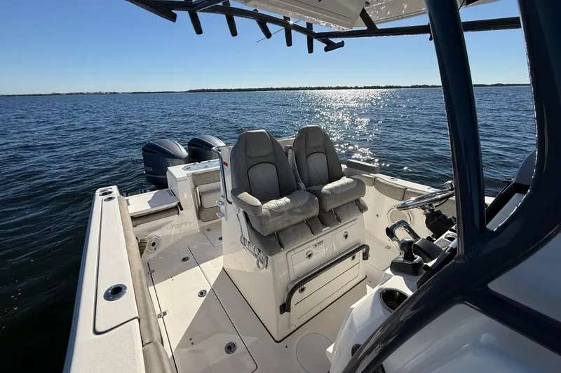 Slide: The Image of 2021 Sea Fox 288 Commander boat interior with dual seats and ocean view. - 71