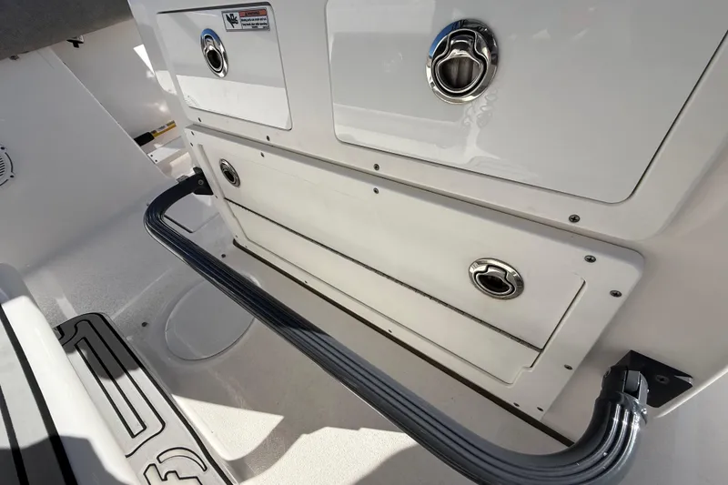 Slide: The Image of 2021 Sea Fox 288 Commander boat storage compartments with stainless steel handles. - 75