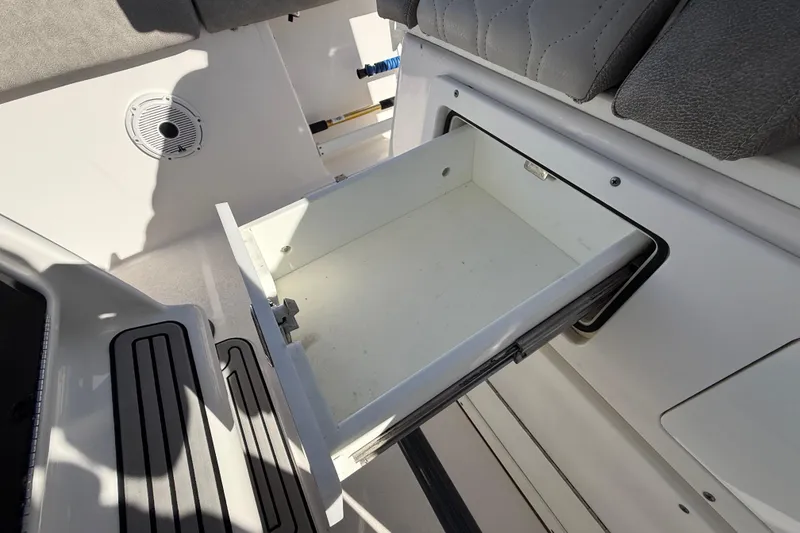 Slide: The Image of Open storage drawer on 2021 Sea Fox 288 Commander boat interior. - 77