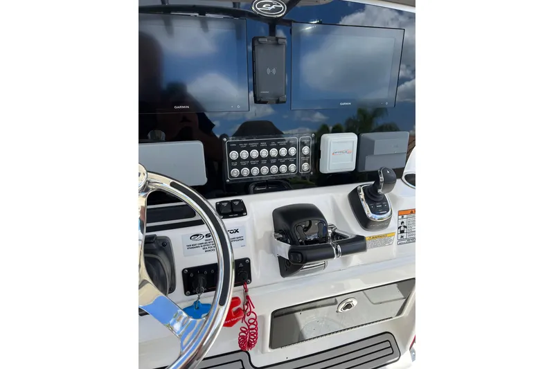 Slide: The Image of 2021 Sea Fox 288 Commander boat on calm blue water. - 8