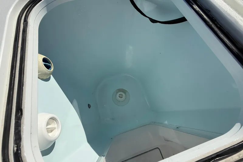 Slide: The Image of 2021 Sea Fox 288 Commander livewell interior, featuring clean, spacious design. - 87