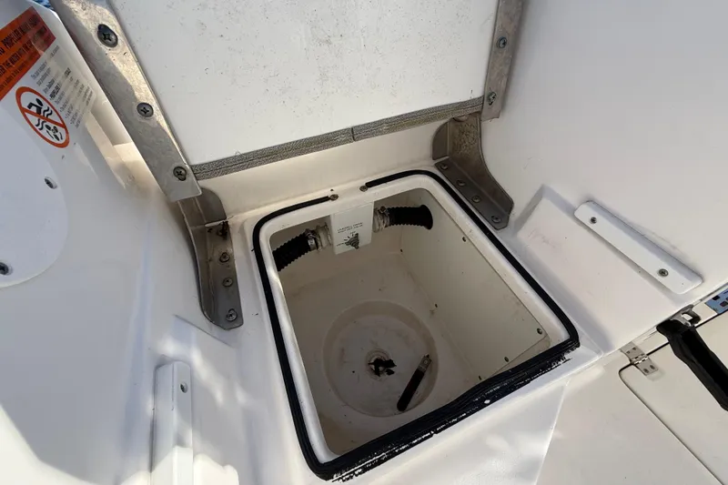 Slide: The Image of Open storage compartment on a 2021 Sea Fox 288 Commander boat. - 92