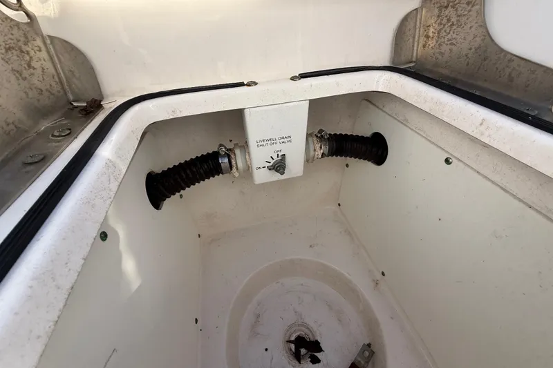 Slide: The Image of Livewell drain and shut-off valve in 2021 Sea Fox 288 Commander boat. - 93