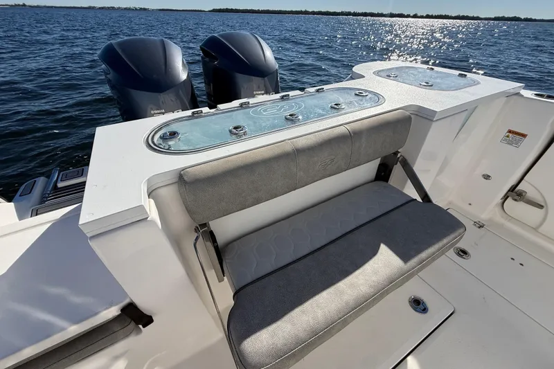 Slide: The Image of 2021 Sea Fox 288 Commander boat with dual engines and cushioned seating. - 94