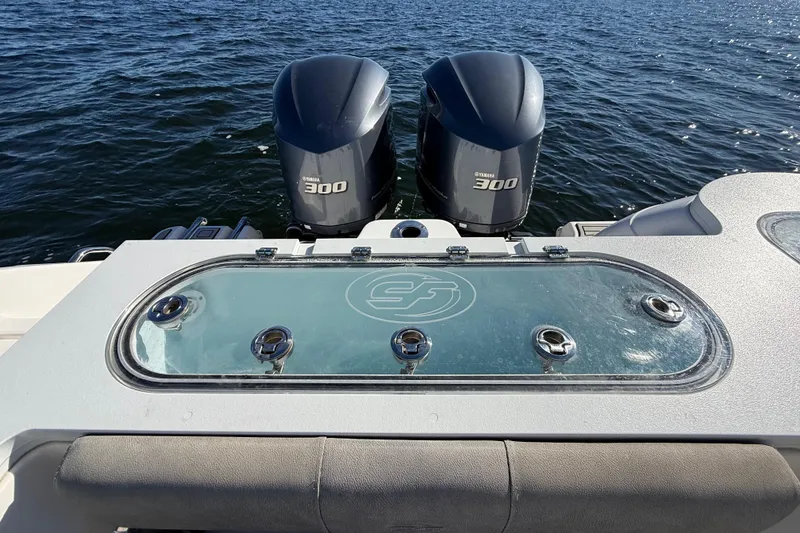 Slide: The Image of 2021 Sea Fox 288 Commander boat with dual Yamaha 300 engines on open water. - 95