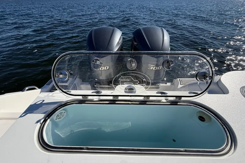 Slide: The Image of 2021 Sea Fox 288 Commander boat with dual Yamaha 300 engines on open water. - 96