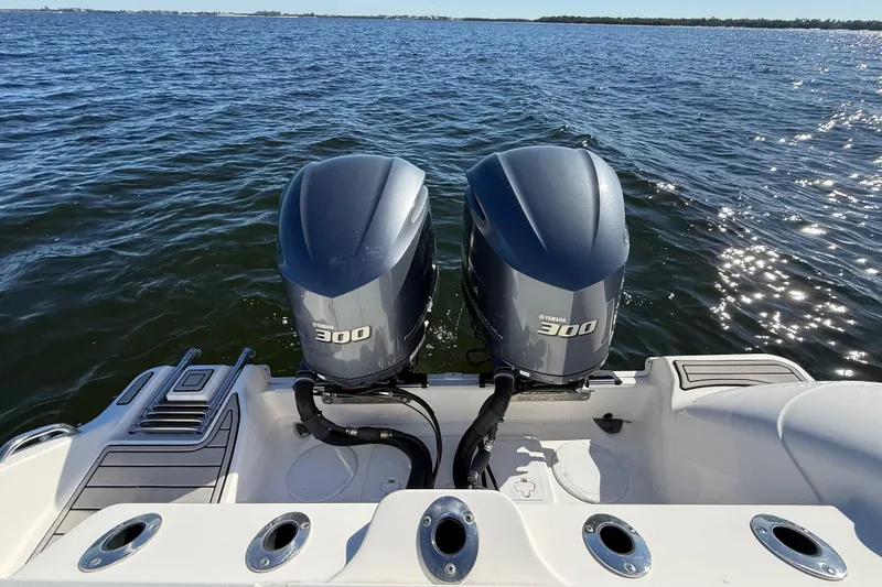 Slide: The Image of 2021 Sea Fox 288 Commander with twin Yamaha 300 engines on open water. - 99