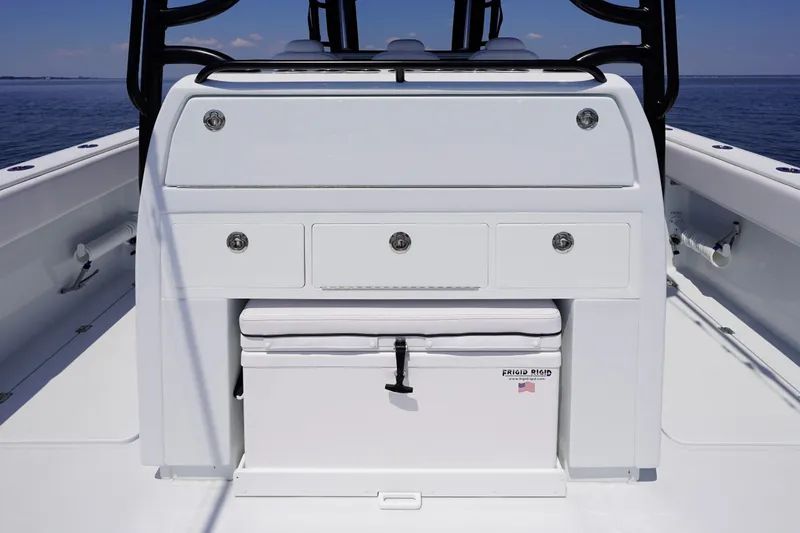 Slide: The Image of 2026 Invincible 40 Catamaran interior with storage compartments and cooler on deck. - 22