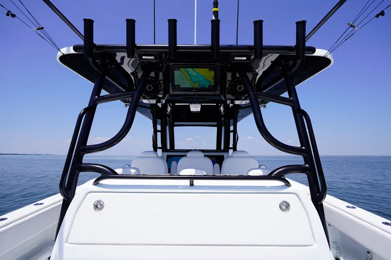 Slide: The Image of 2026 Invincible 40 Catamaran, sleek design, open sea, advanced navigation system. - 9