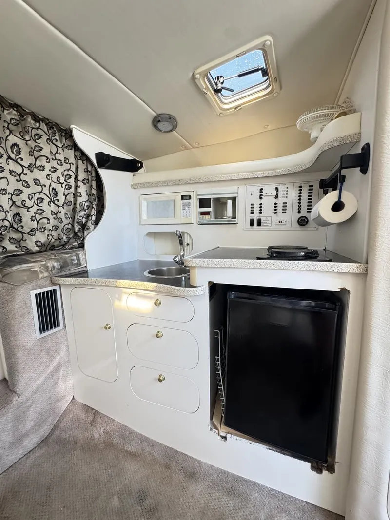 Slide: The Image of Rinker Express Cruiser 310 Fiesta Vee 2000 - 11