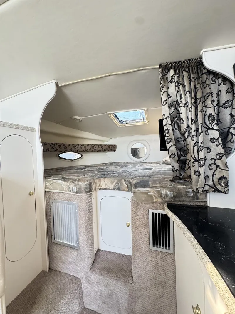 Slide: The Image of Rinker Express Cruiser 310 Fiesta Vee 2000 - 12