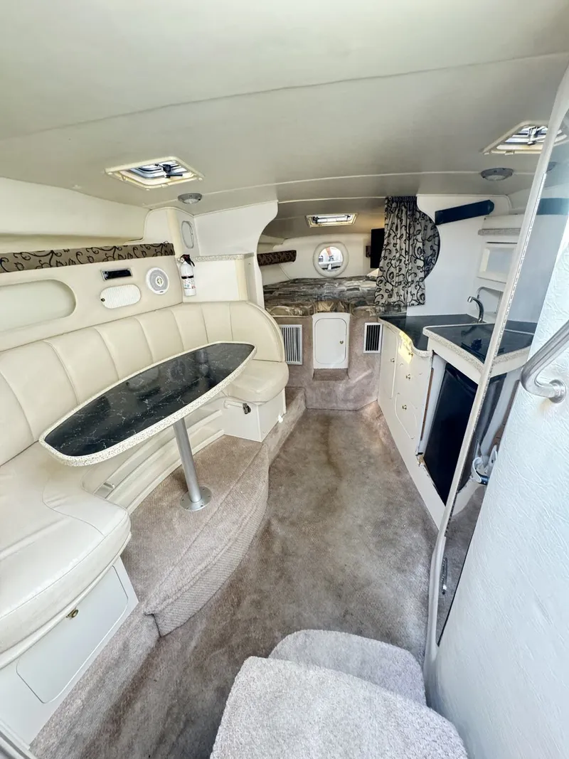 Slide: The Image of Rinker Express Cruiser 310 Fiesta Vee 2000 - 8