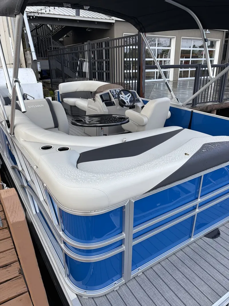 Slide: The Image of 2026 Sylvan Mirage Cruise 8520 pontoon boat at dock. - 3