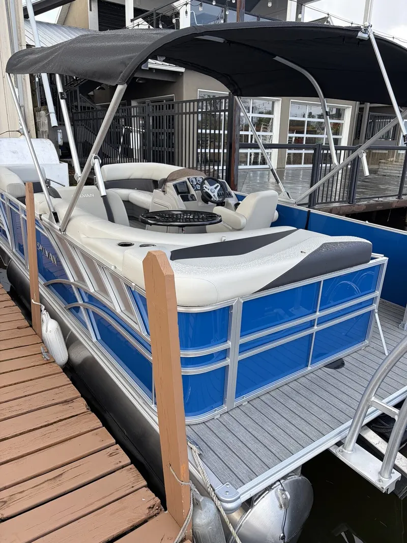 Slide: The Image of 2026 Sylvan Mirage Cruise 8520 pontoon boat at dock. - 5