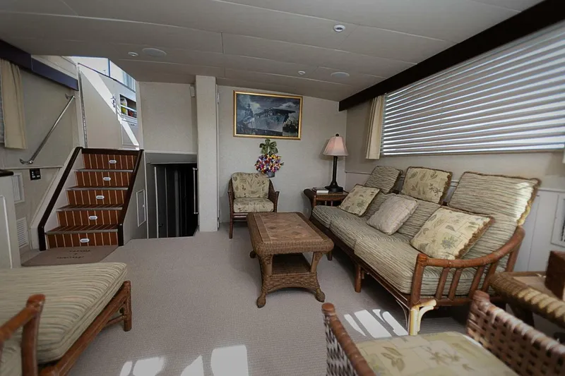 Slide: The Image of Interior of 1969 Derecktor 68 Hunt Motor Yacht with elegant seating and decor. - 11