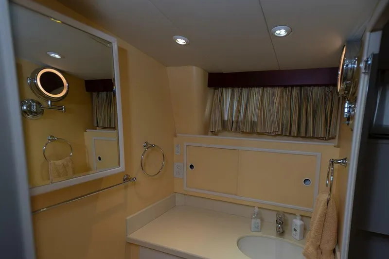 Slide: The Image of Bathroom interior of 1969 Derecktor 68 Hunt Motor Yacht with mirror and sink. - 16