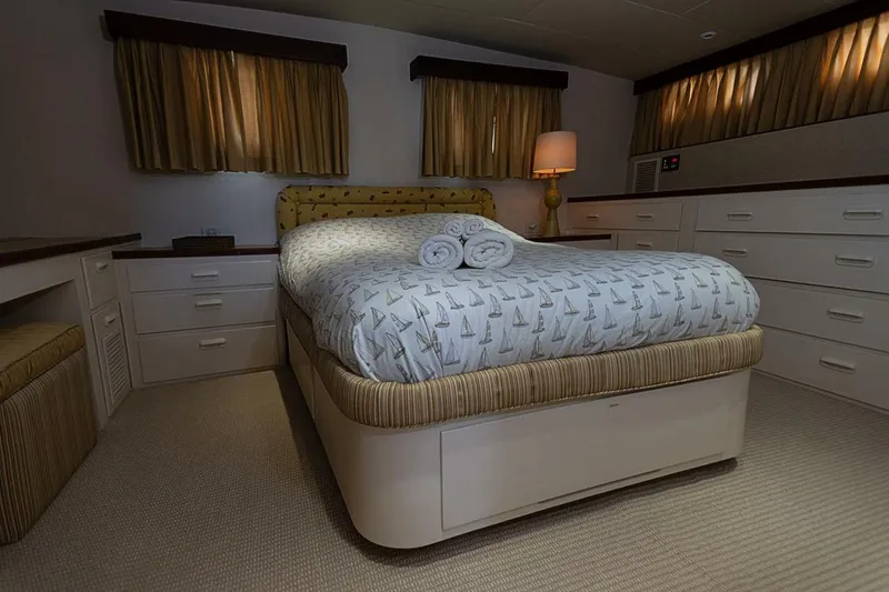Slide: The Image of Luxurious bedroom interior of 1969 Derecktor 68 Hunt Motor Yacht with elegant decor. - 19