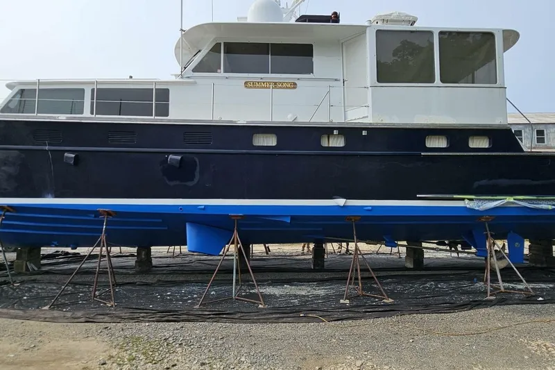 Slide: The Image of 1969 Derecktor 68 Hunt Motor Yacht on dry dock for maintenance. - 26