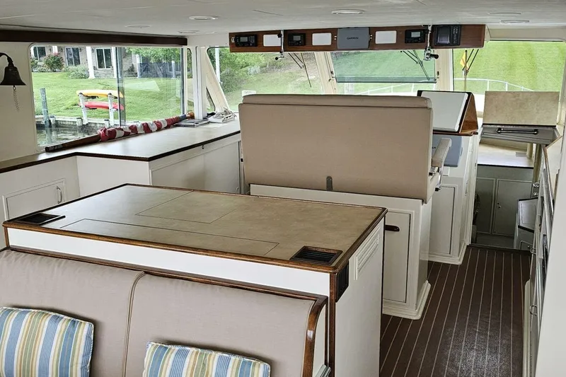 Slide: The Image of Interior of 1969 Derecktor 68 Hunt Motor Yacht with elegant seating and navigation area. - 7