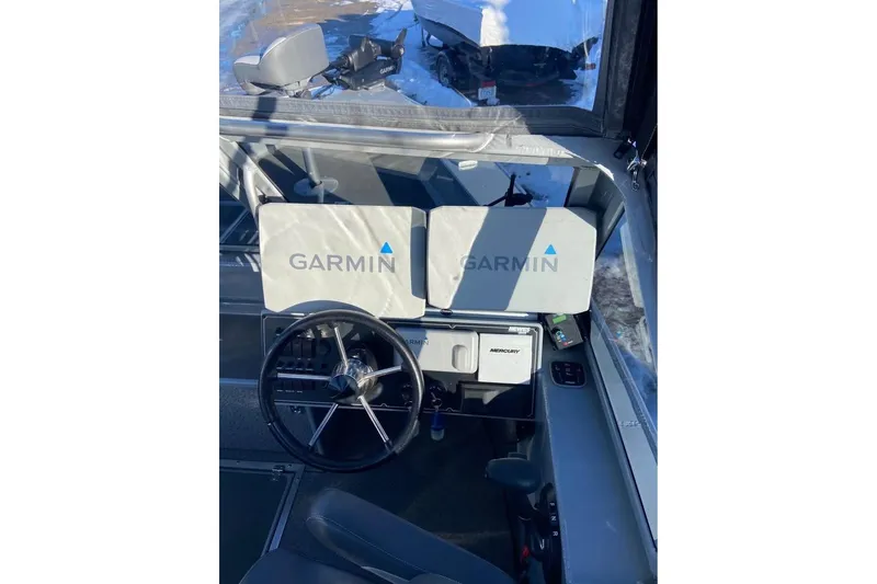 Slide: The Image of 2024 Hewescraft 221 Evolution boat dashboard with Garmin navigation system. - 18