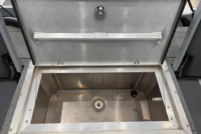 Slide: The Image of Open storage compartment in 2024 Hewescraft 221 Evolution boat. - 9