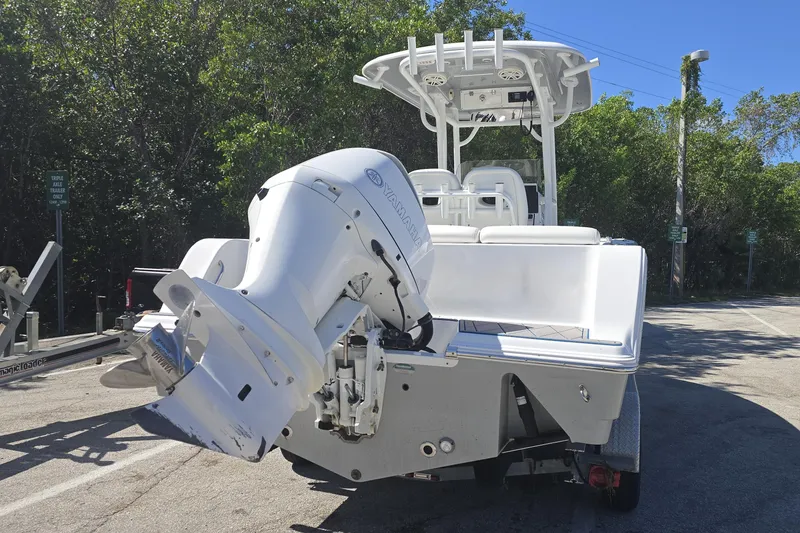 Slide: The Image of 2018 Sportsman Heritage 241 Center Console boat with Yamaha outboard motor on trailer. - 6