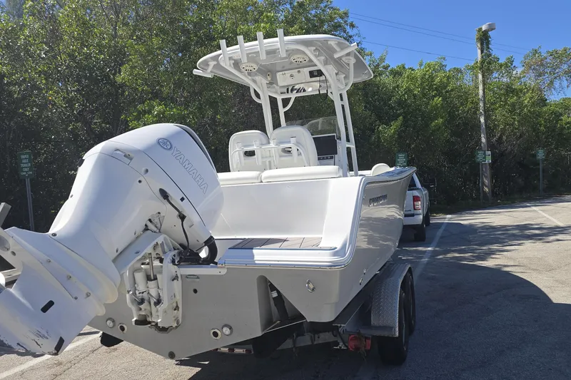 Slide: The Image of 2018 Sportsman Heritage 241 Center Console boat with Yamaha engine on trailer. - 7