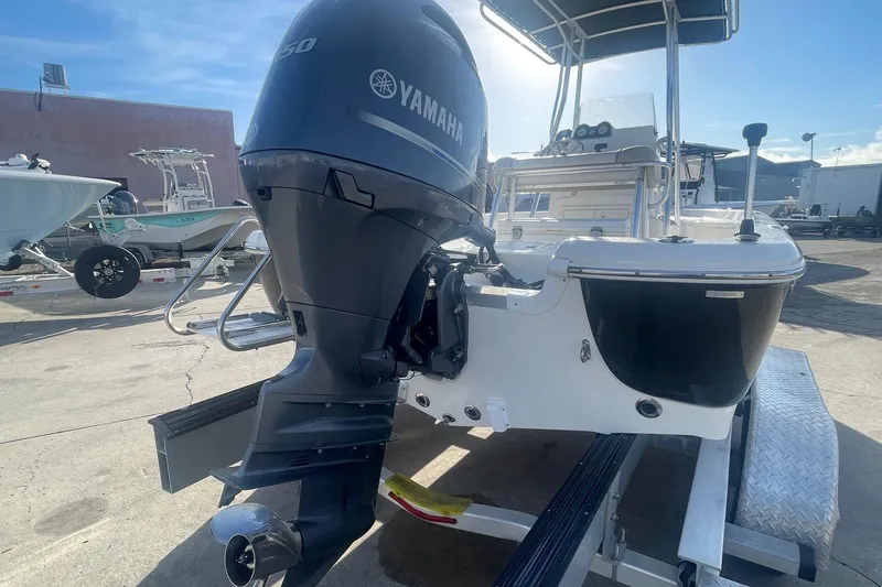 Slide: The Image of 2016 NauticStar 2110 Sport boat with Yamaha outboard engine on trailer. - 3