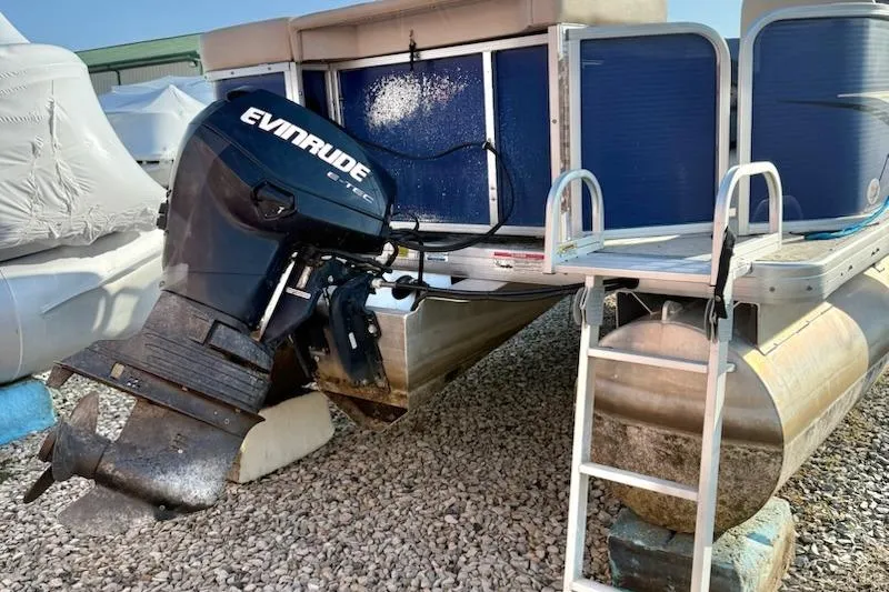 Slide: The Image of 2009 Sweetwater Tuscany Series 2086-23 pontoon boat with Evinrude outboard motor. - 6