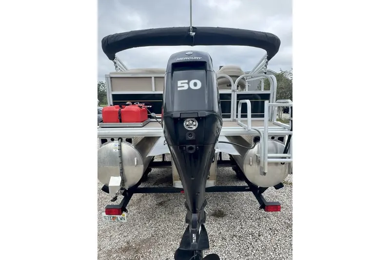 Slide: The Image of 2022 Sun Tracker Bass Buggy 16 XL with Mercury 50 outboard motor, rear view. - 5