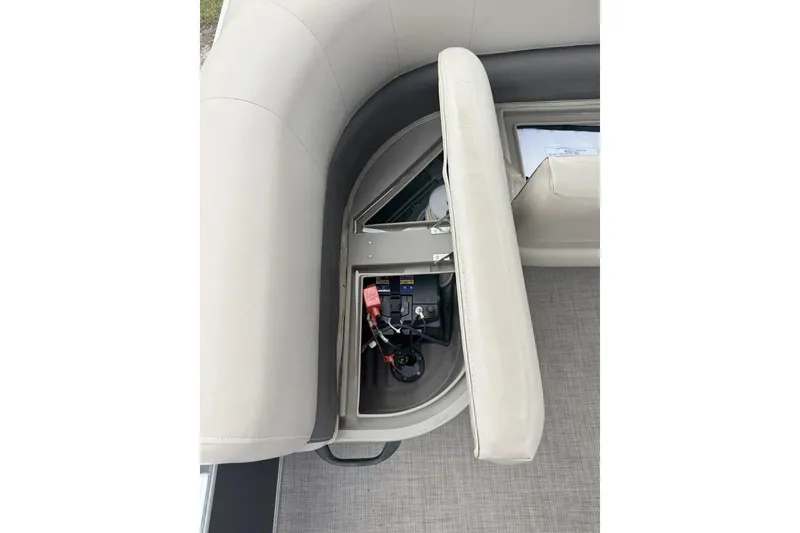 Slide: The Image of 2022 Sun Tracker Bass Buggy 16 XL boat seat storage compartment with battery. - 7