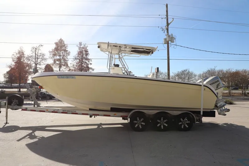 Slide: The Image of 2005 Sea Chaser 2600 Offshore boat on trailer, side view. - 3