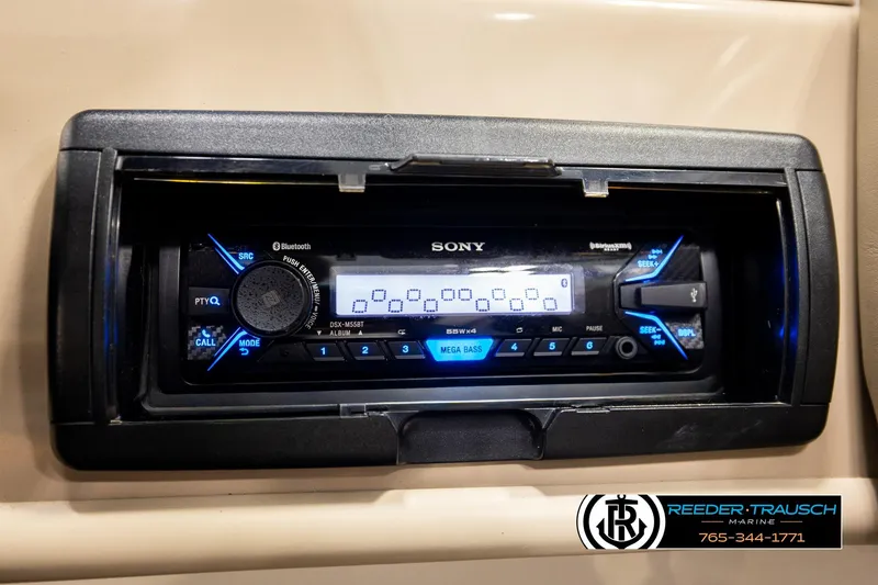 Slide: The Image of Sony stereo system in a 2003 Four Winns 180 Freedom I/O boat dashboard. - 33