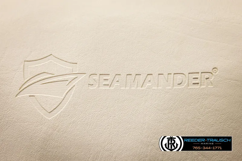 Slide: The Image of Embossed Seamaner logo on beige surface, Reeder-Trausch Marine contact details visible. - 36