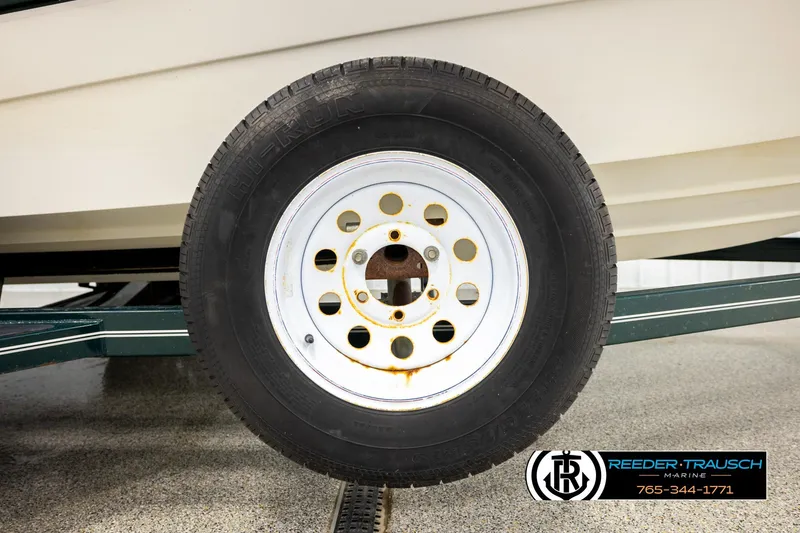 Slide: The Image of Trailer wheel of 2003 Four Winns 180 Freedom I/O boat, Reeder-Trausch Marine. - 51
