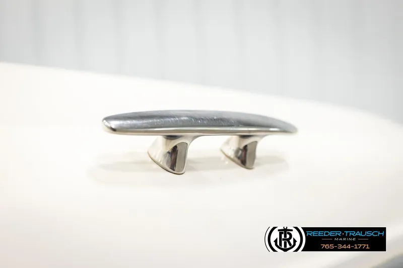 Slide: The Image of Chrome cleat on 2003 Four Winns 180 Freedom I/O boat deck. - 52