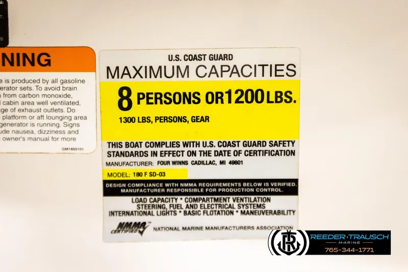 Slide: The Image of 2003 Four Winns 180 Freedom I/O capacity label, 8 persons or 1200 lbs, U.S. Coast Guard compliant. - 53