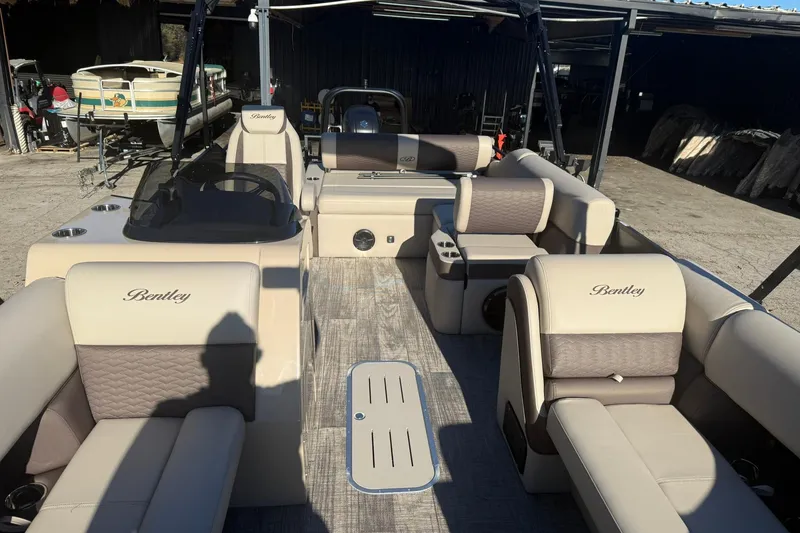 Slide: The Image of 2026 Bentley Pontoons Elite 223 Swingback Bench with luxurious interior. - 5