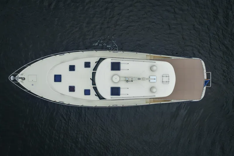 Slide: The Image of Overhead view of 2018 Palm Beach Motor Yachts PB55 on water. - 6