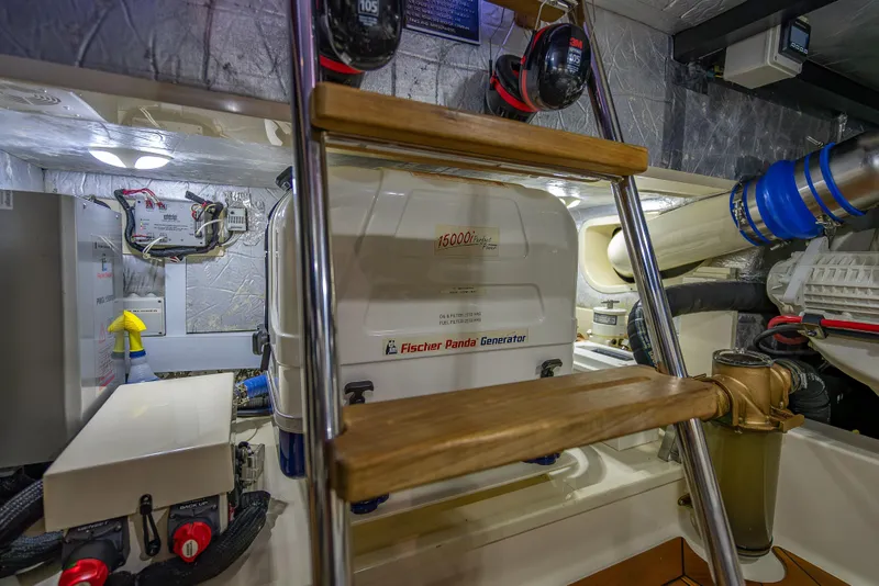 Slide: The Image of Engine room of 2018 Palm Beach Motor Yachts PB55 with Fischer Panda generator. - 62