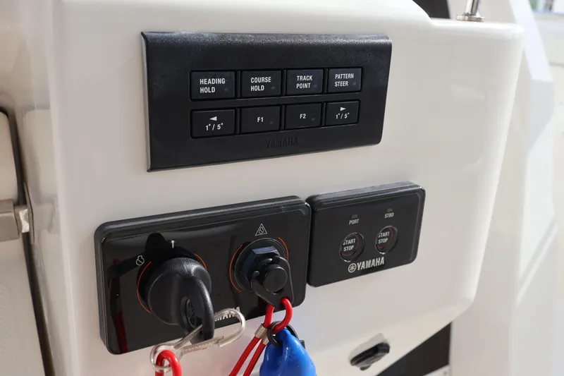 Slide: The Image of Control panel of 2021 Pursuit S 328 Sport boat with Yamaha controls. - 22