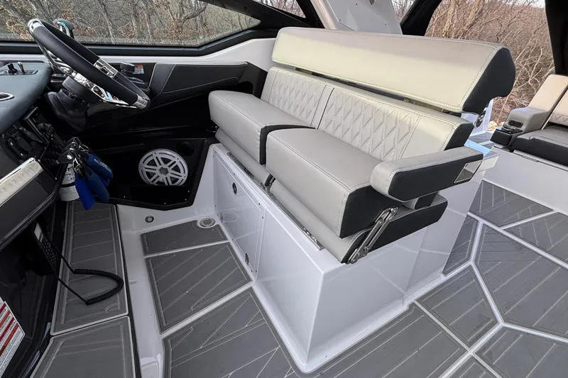 Slide: The Image of 2026 Monterey 385 Super Express interior with luxury seating and modern dashboard design. - 12