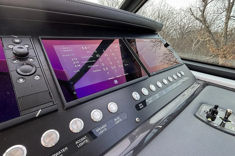 Slide: The Image of Dashboard of 2026 Monterey 385 Super Express with digital displays and control buttons. - 17