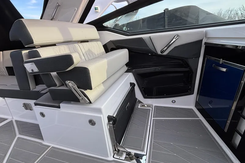 Slide: The Image of 2026 Monterey 385 Super Express interior with modern seating and sleek design. - 24