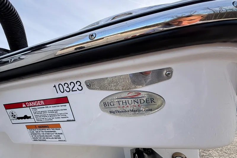 Slide: The Image of 2026 Monterey 385 Super Express boat with Big Thunder Marine logo and safety warnings. - 3