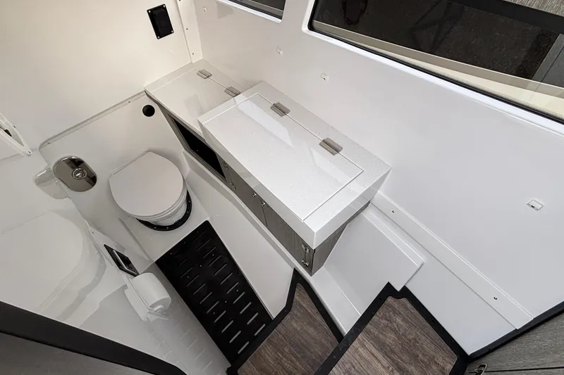 Slide: The Image of Modern bathroom interior of 2026 Monterey 385 Super Express yacht, featuring sleek design and compact layout. - 56