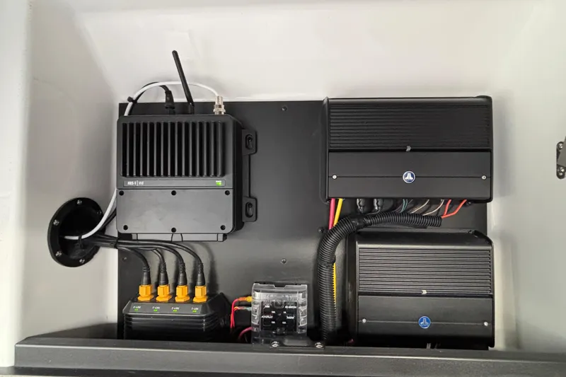 Slide: The Image of Electrical system components in a 2026 Monterey 385 Super Express boat. - 68