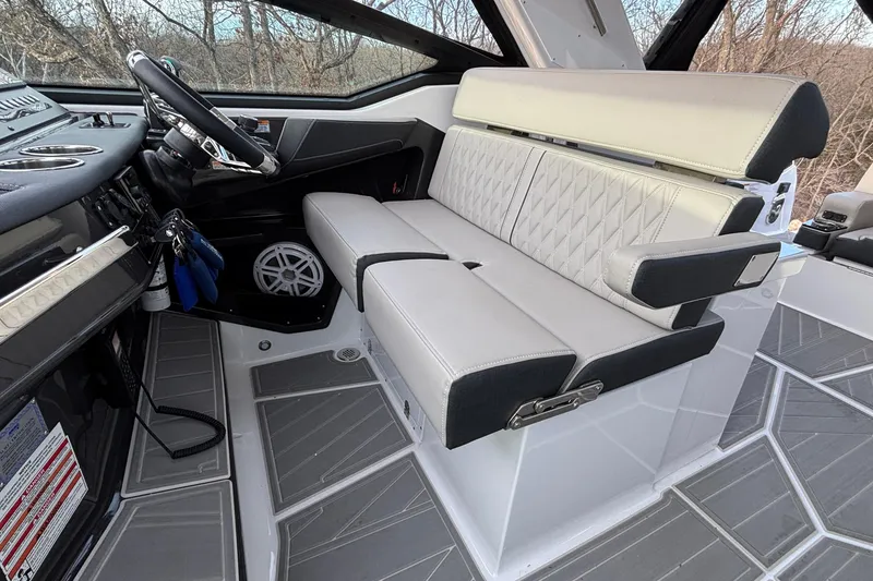 Slide: The Image of 2026 Monterey 385 Super Express interior with luxurious seating and modern dashboard design. - 11